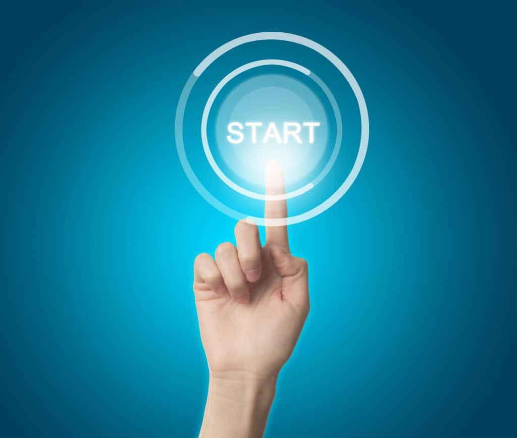 finger-pressing-the-start-button